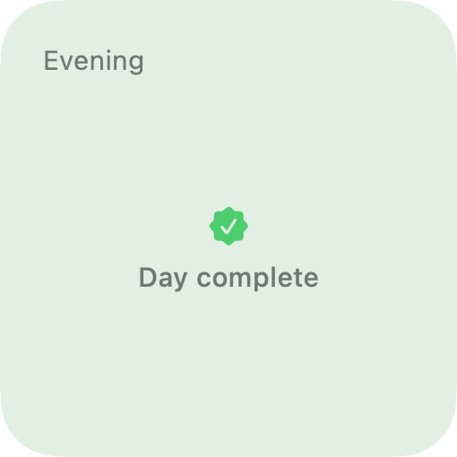 Small Reminders widget on a completed day: a green wash with a seal and Day complete